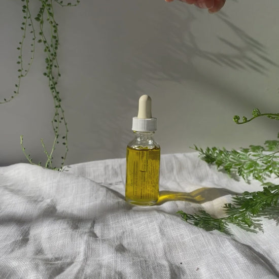 Earth face oil on hands video